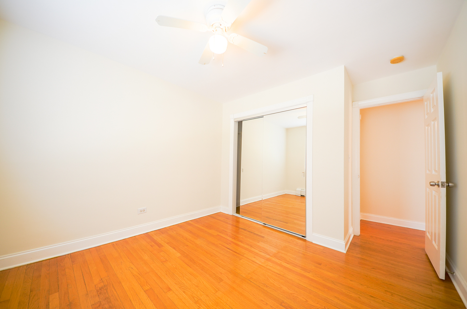 1308 Perry Street, Unit B Des Plaines, IL 60016 - Photo 11 of 11 a view of empty room with wooden floor