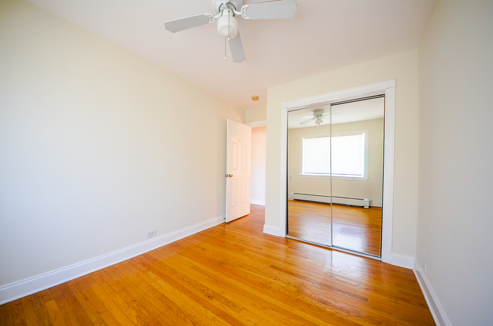 1308 Perry Street, Unit B Des Plaines, IL 60016 - Photo 10 of 11 a view of empty room with wooden floor