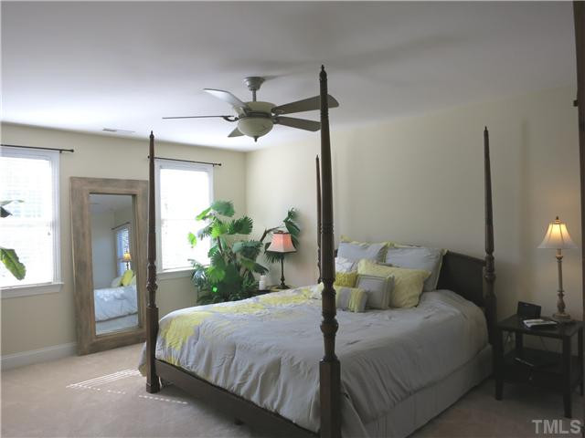 10805 Sagehurst Place Raleigh, NC 27614 - Photo 15 of 25 The spacious Master Bedroom has neutral carpet, CF, lots of windows, big WIC & lg private Bath. Master Bedroom