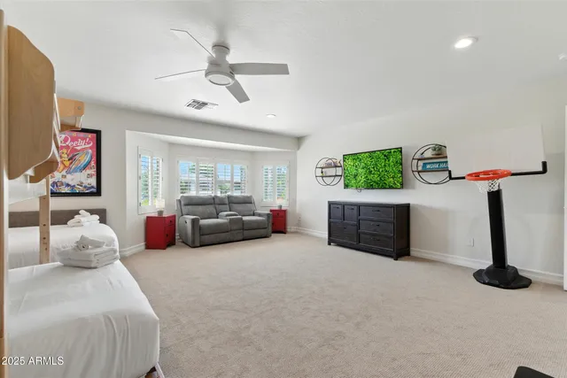 a bedroom with furniture and a couch