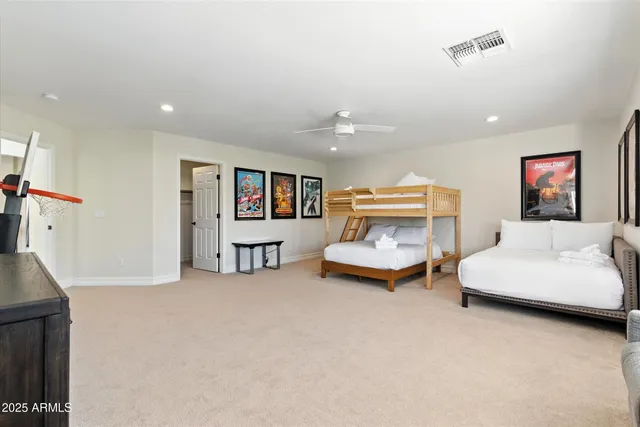 a bathroom with a double vanity sink and mirror