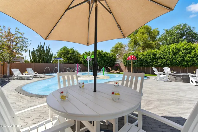 a outdoor space with lots of white furniture