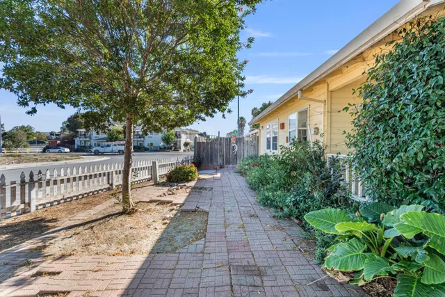 a view of a pathway with a bench
