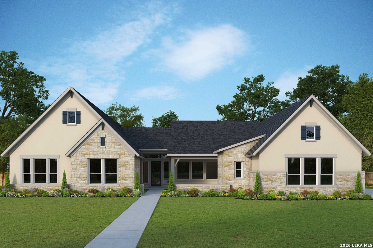 761 Falcon Cove Castroville, TX 78009 - Photo 1 of 11 a front view of house with yard and green space