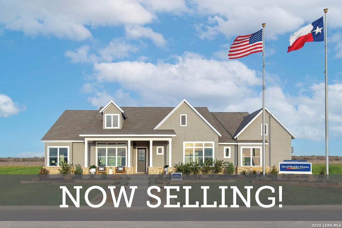 761 Falcon Cove Castroville, TX 78009 - Photo 5 of 11 a view of a white house with sign broad