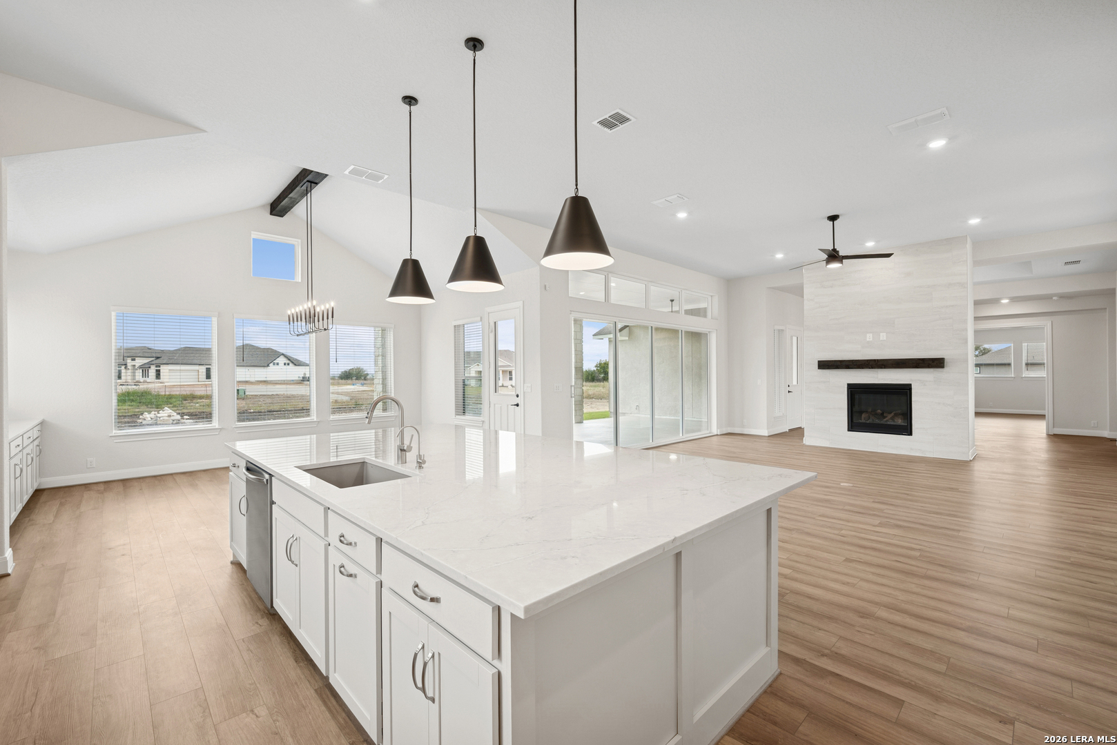 761 Falcon Cove Castroville, TX 78009 - Photo 9 of 11 a kitchen with counter top space and wooden floor