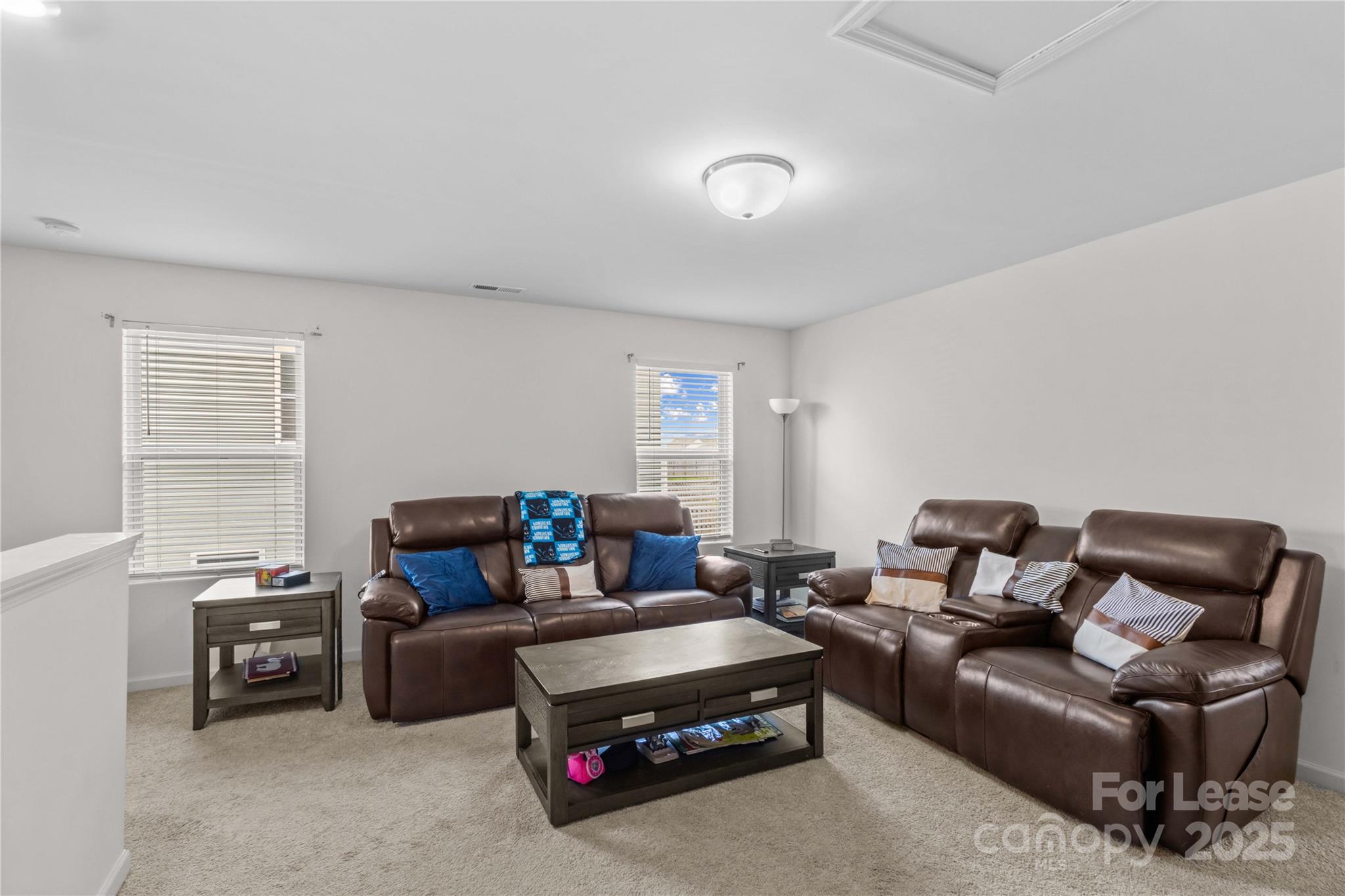 125 Mooring Drive Statesville, NC 28677 - Photo 15 of 32 a living room with furniture a window and a couch
