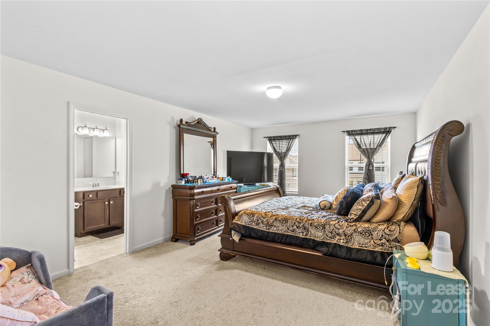 125 Mooring Drive Statesville, NC 28677 - Photo 20 of 32 a bedroom with a bed and a couch