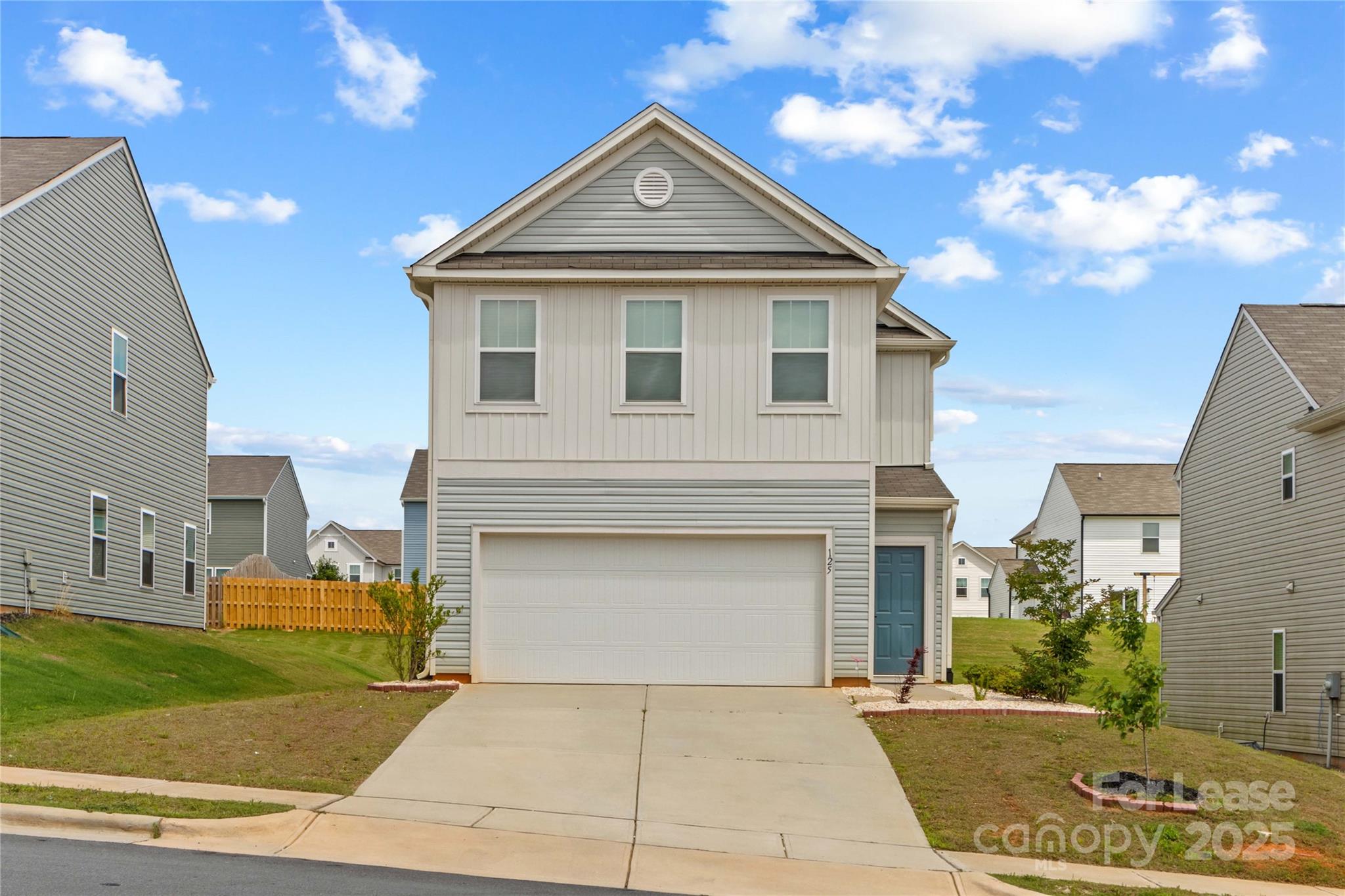 125 Mooring Drive Statesville, NC 28677 - Photo 2 of 32 a front view of a house with garden