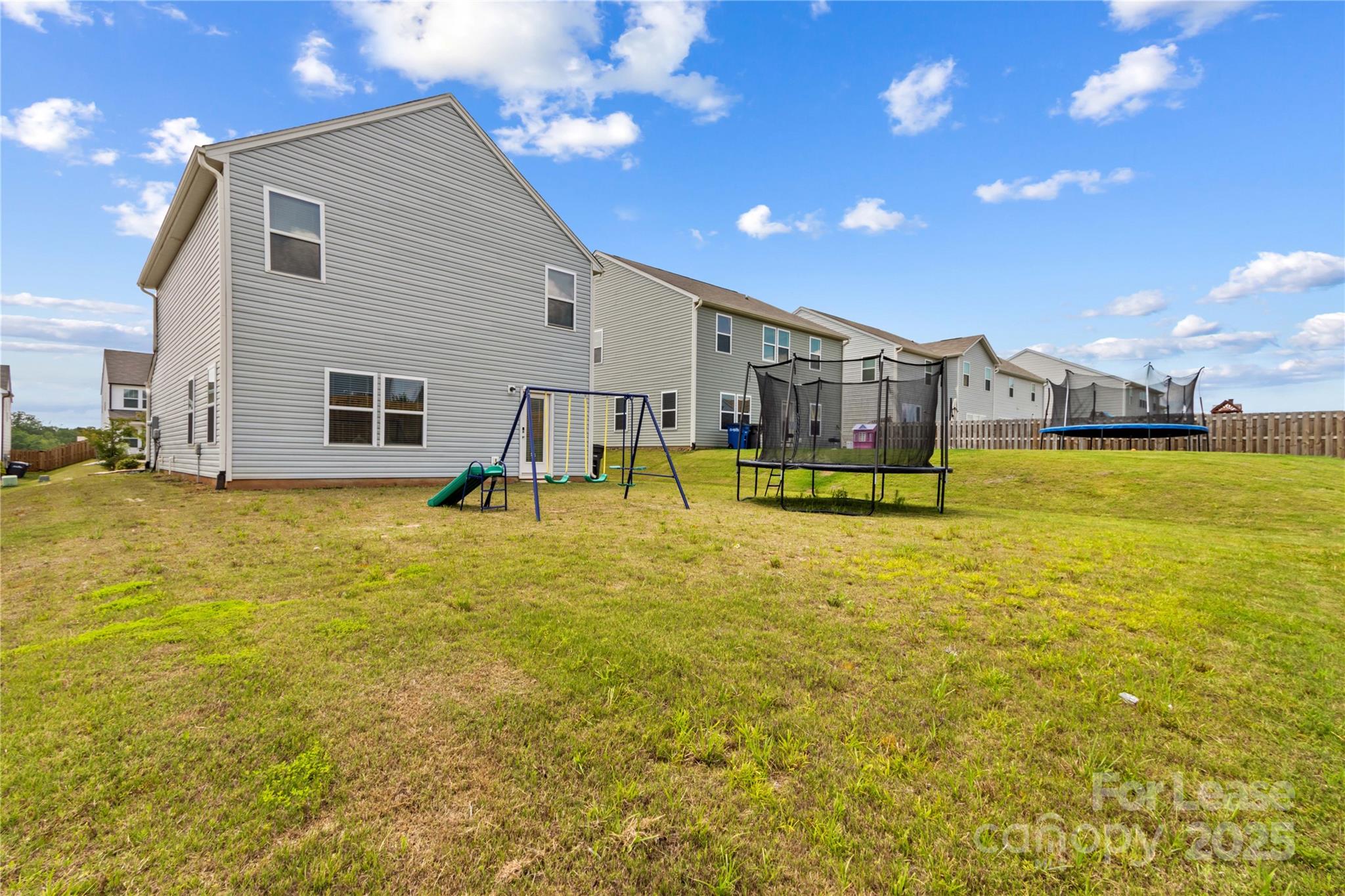 125 Mooring Drive Statesville, NC 28677 - Photo 28 of 32 a swimming pool with outdoor seating and yard