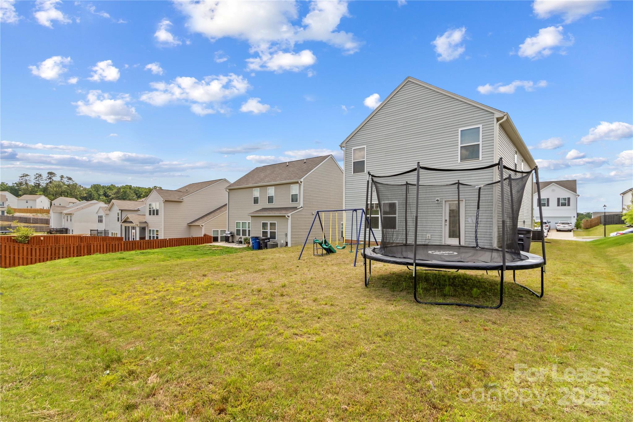 125 Mooring Drive Statesville, NC 28677 - Photo 29 of 32 a swimming pool with outdoor seating and yard