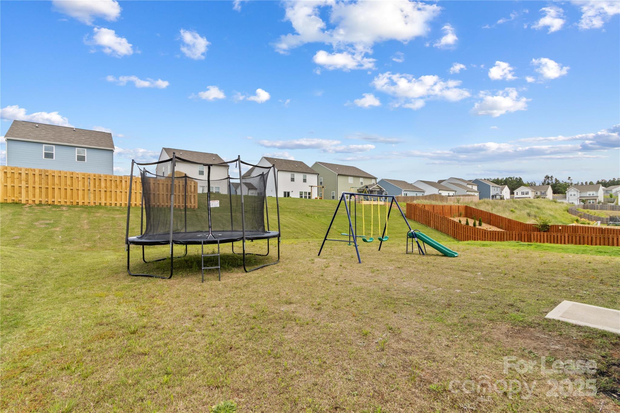 125 Mooring Drive Statesville, NC 28677 - Photo 30 of 32 a view of a swimming pool with an outdoor space and seating