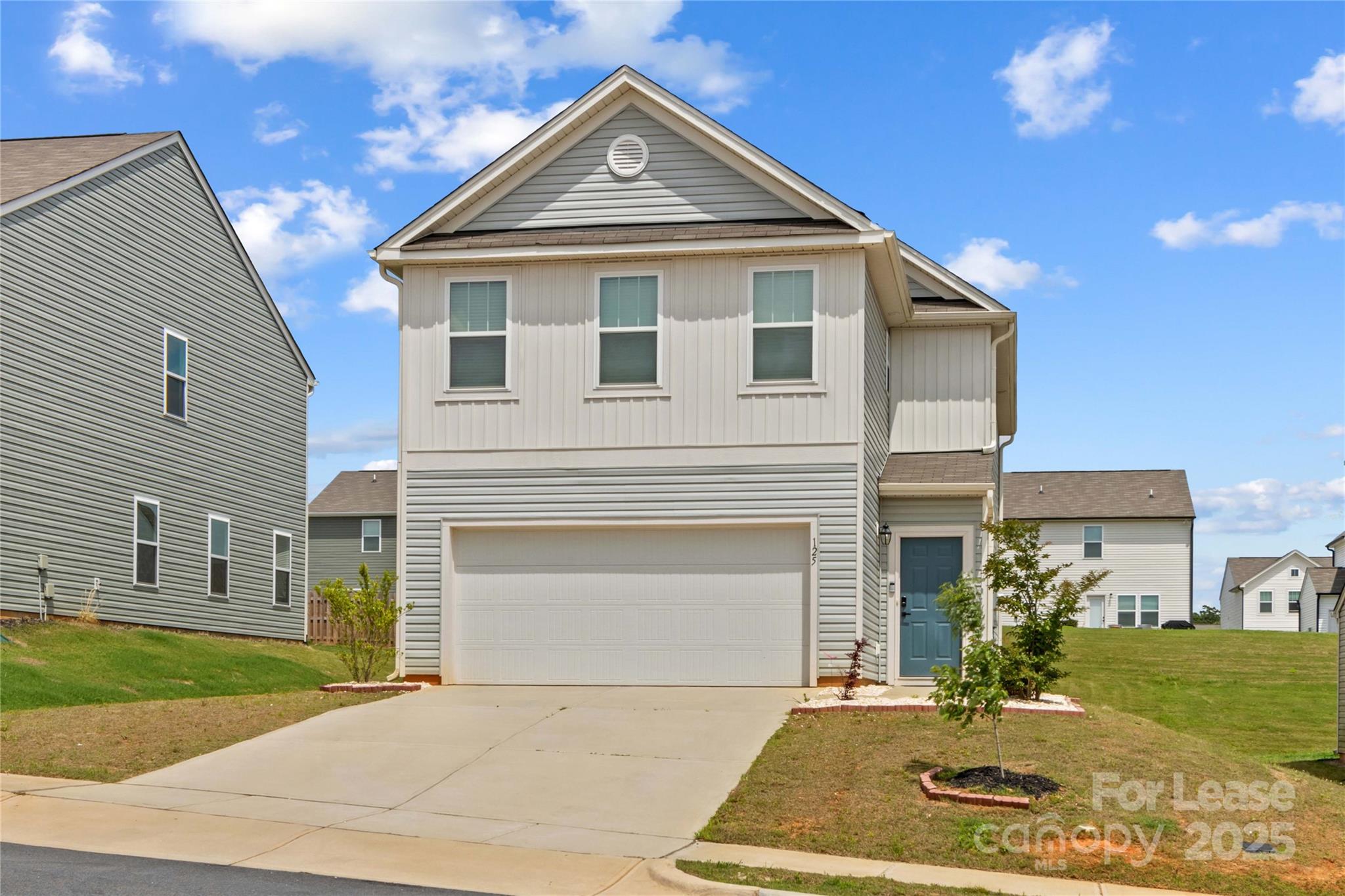 125 Mooring Drive Statesville, NC 28677 - Photo 3 of 32 a front view of a house with a yard