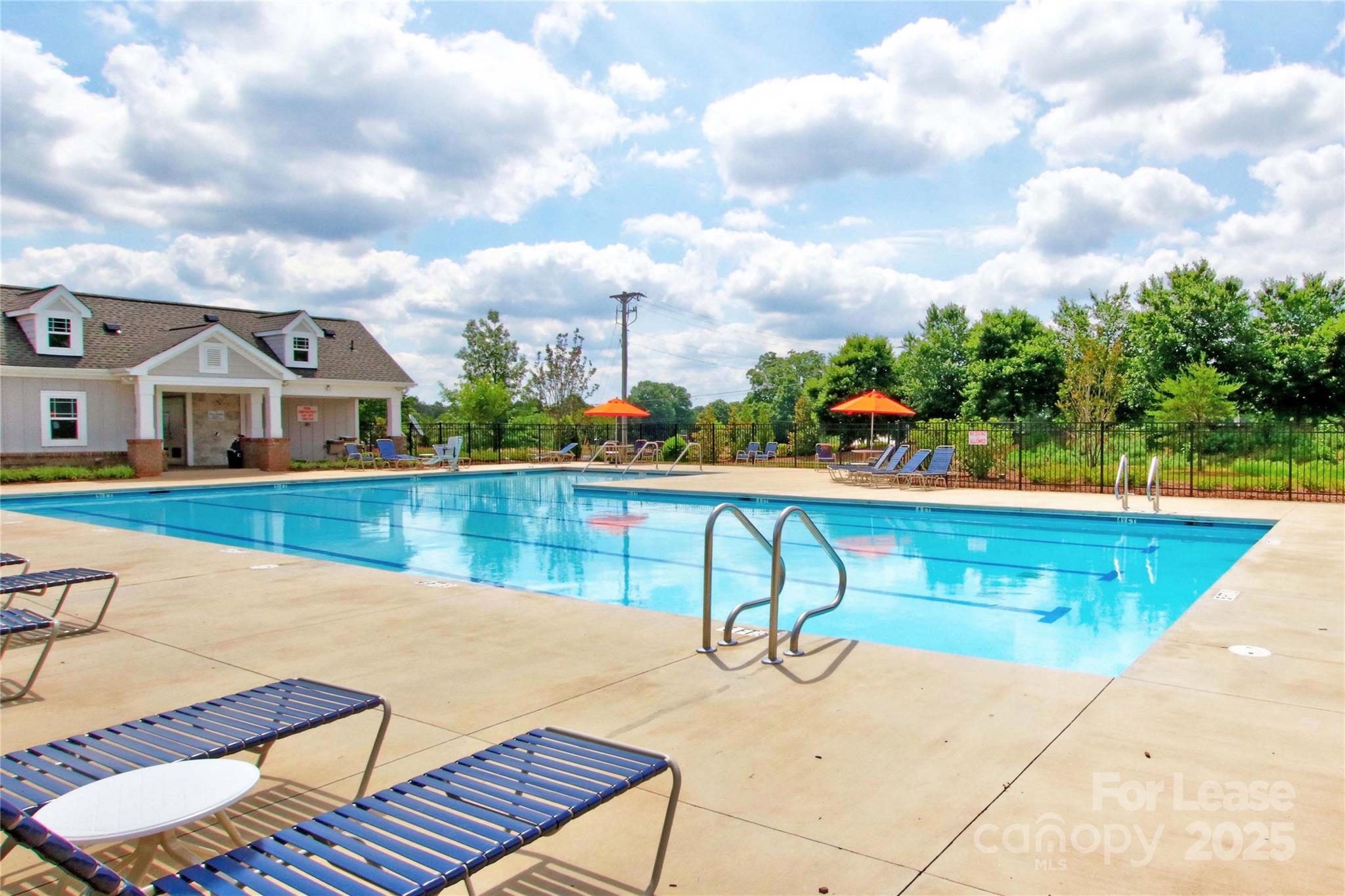 125 Mooring Drive Statesville, NC 28677 - Photo 31 of 32 a view of swimming pool with seating area and barbeque oven