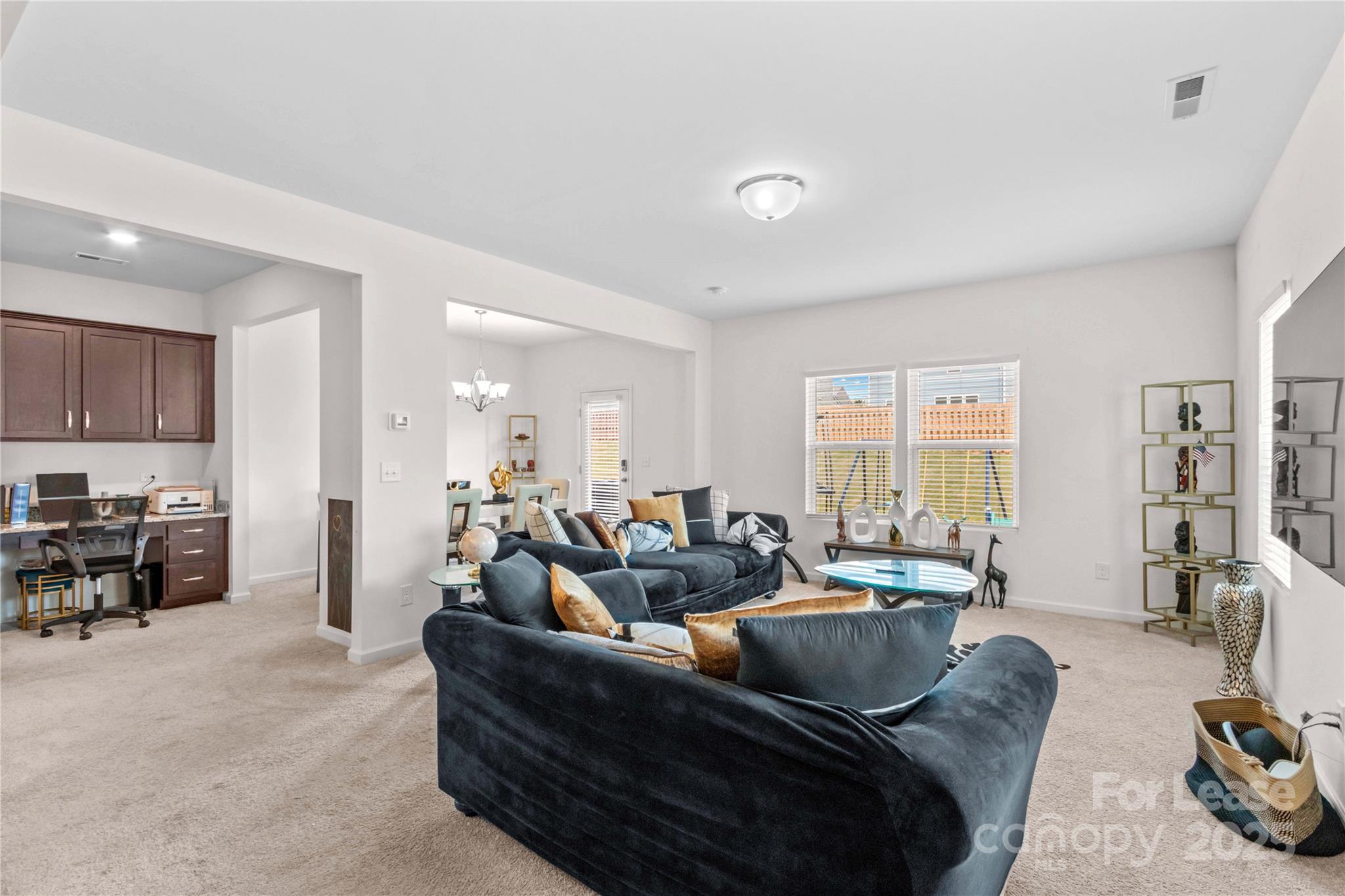 125 Mooring Drive Statesville, NC 28677 - Photo 9 of 32 a living room with furniture and a large window