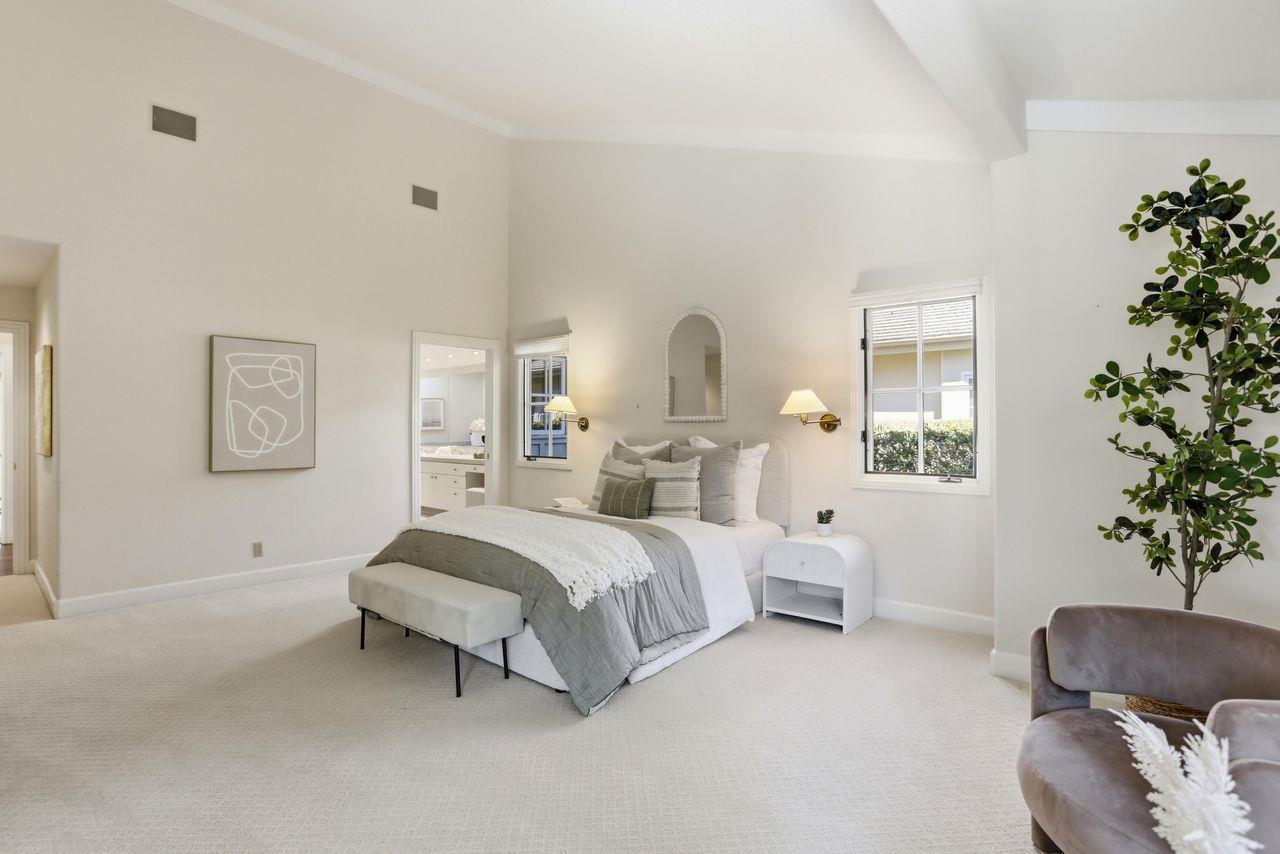 25381 Markham Lane Salinas, CA 93908 - Photo 25 of 47 a bedroom with a bed and a potted plant
