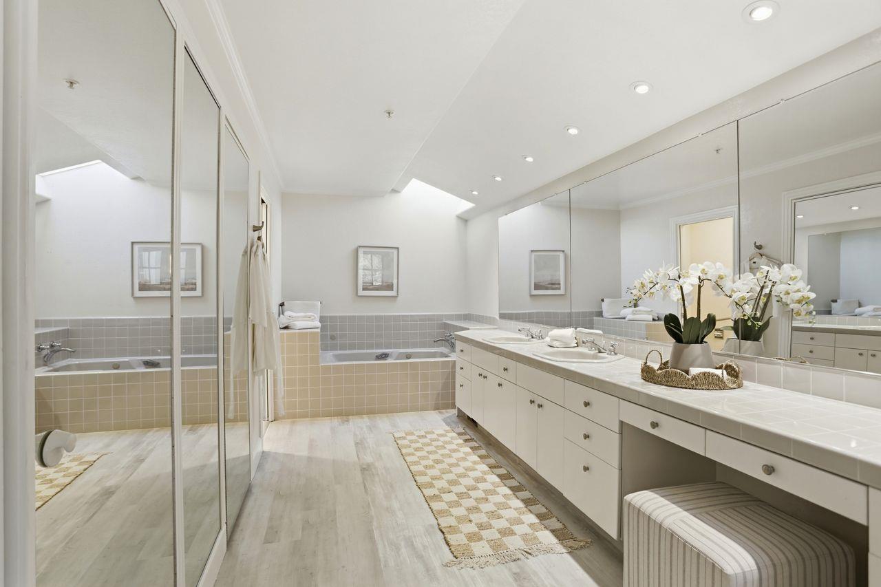 25381 Markham Lane Salinas, CA 93908 - Photo 26 of 47 a large bathroom with a glass door shower and sink