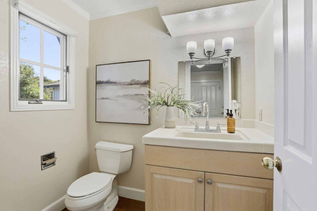 25381 Markham Lane Salinas, CA 93908 - Photo 35 of 47 a bathroom with a sink vanity mirror and toilet