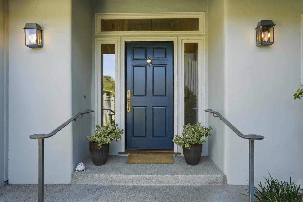 25381 Markham Lane Salinas, CA 93908 - Photo 6 of 47 a potted plant sitting in front of a door