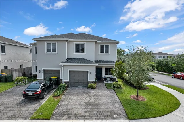 a house with garden in front of it