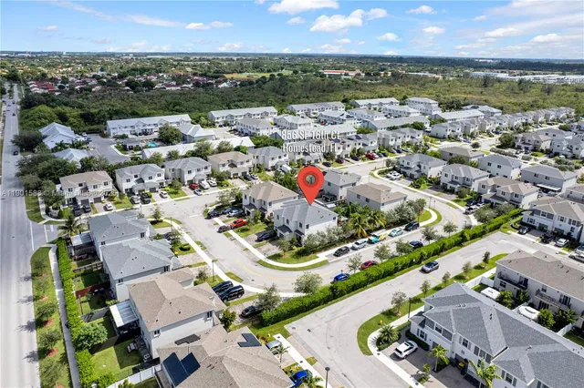 an aerial view of a city with lots of residential buildings