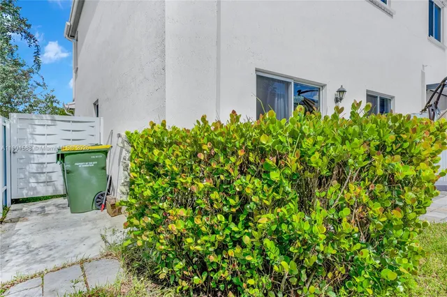 a view of a garden with a fountain