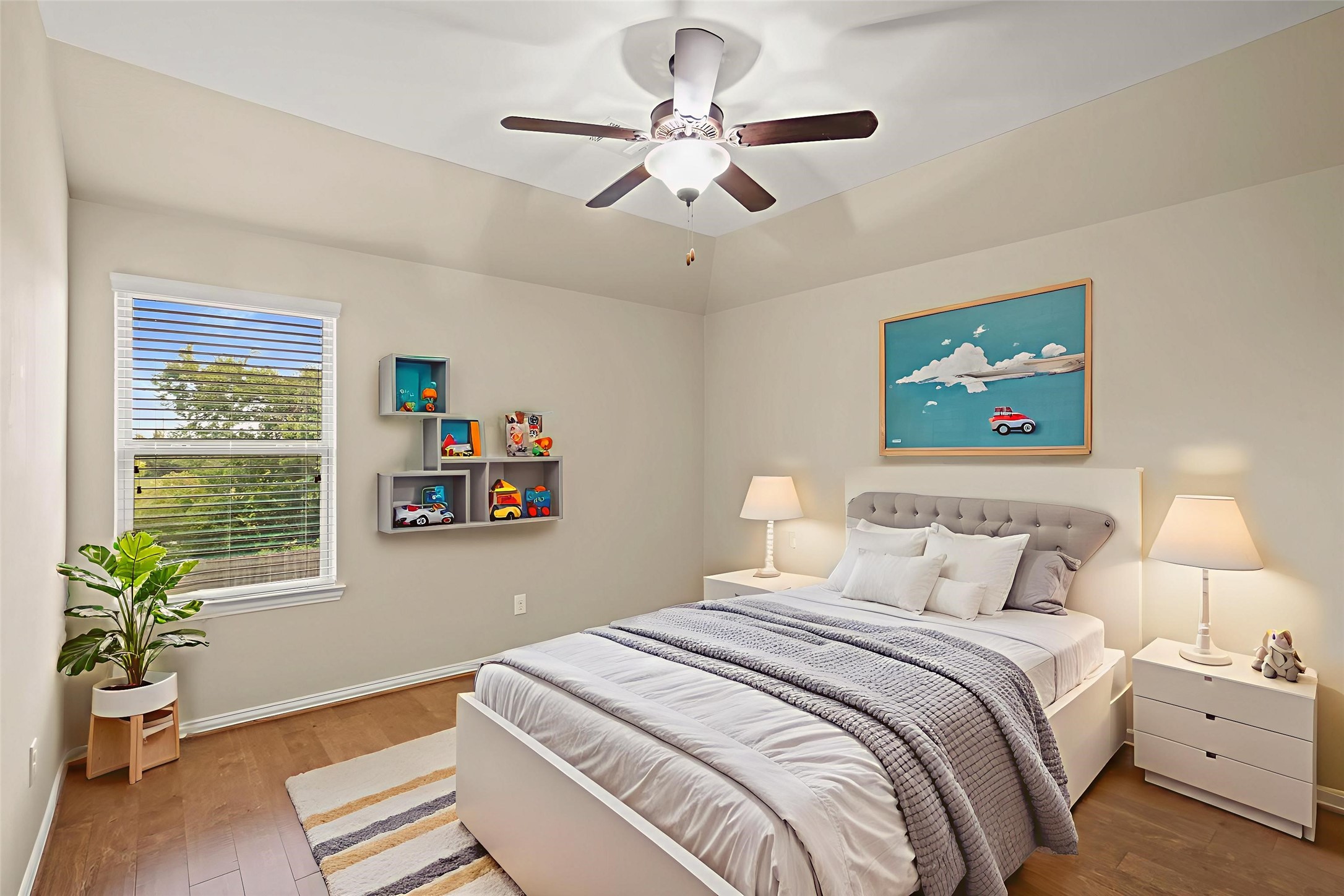 3414 Satton Ranch Lane Fulshear, TX 77441 - Photo 16 of 25 a bedroom with a bed and a chandelier