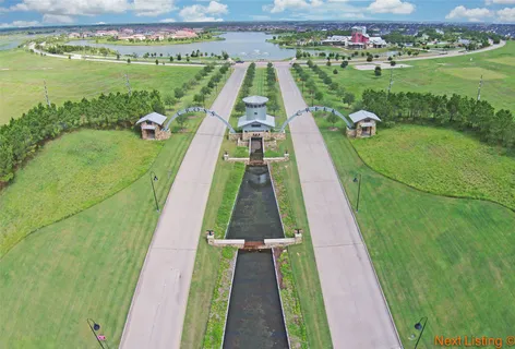 a view of swimming pool with a garden and seating area