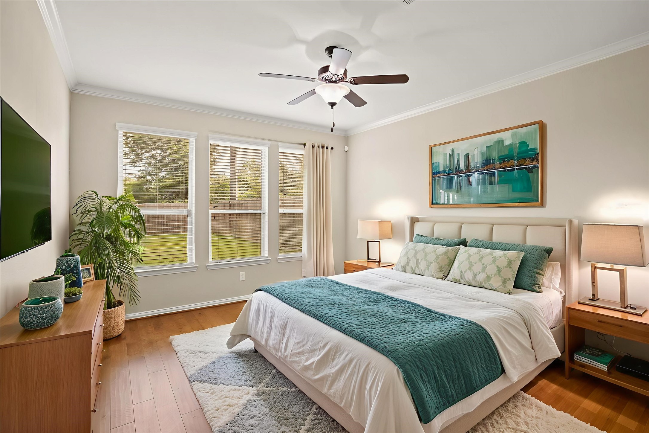 3414 Satton Ranch Lane Fulshear, TX 77441 - Photo 9 of 25 a spacious bedroom with a bed and a large window