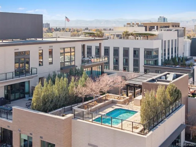 a view of a patio with couches table and chairs
