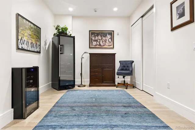 a bathroom with a toilet and a shower curtain