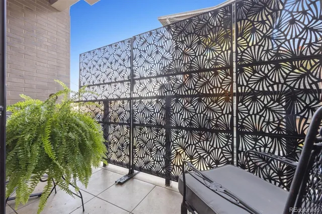 a bathroom with a sink vanity mirror and shower