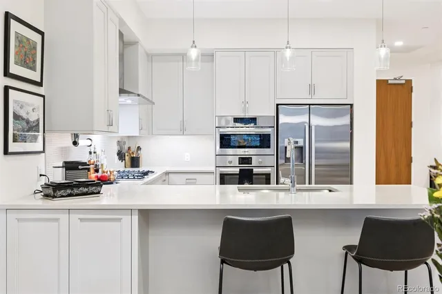 a view of a dining room with furniture