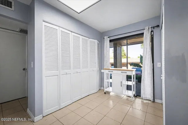 a view of a kitchen with a window
