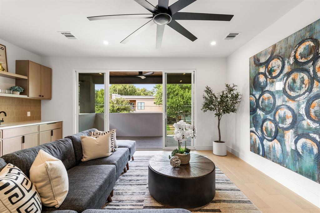 4322 Sexton Lane Dallas, TX 75229 - Photo 15 of 34 a living room with furniture and a large window