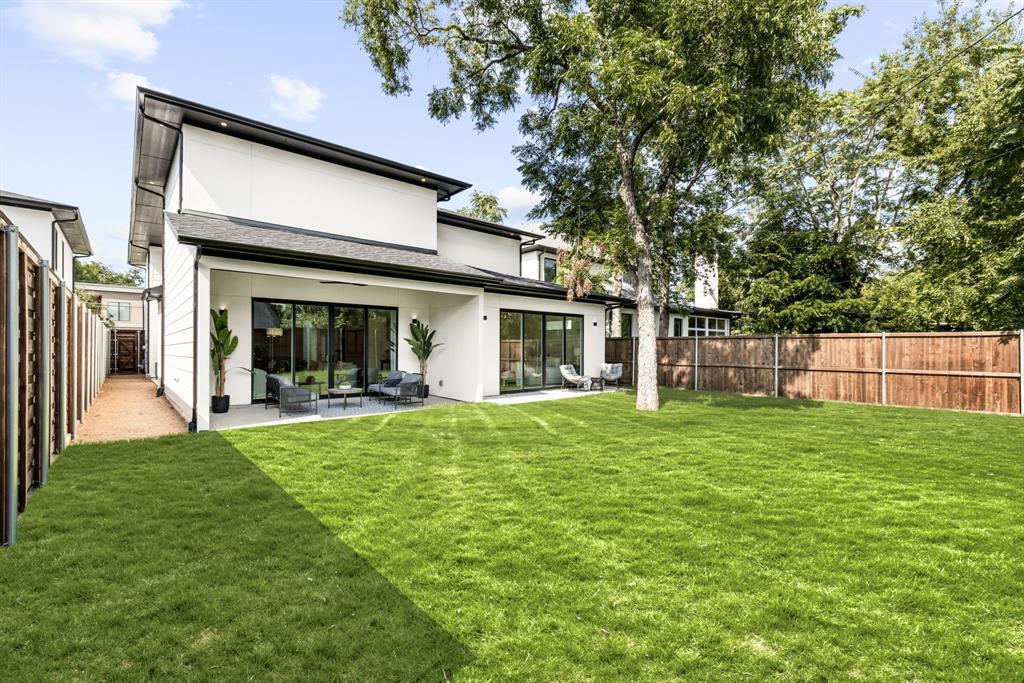 4322 Sexton Lane Dallas, TX 75229 - Photo 32 of 34 a view of a house with backyard and porch