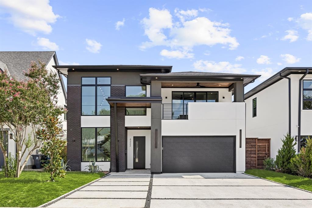 4322 Sexton Lane Dallas, TX 75229 - Photo 34 of 34 a front view of a house with a garden