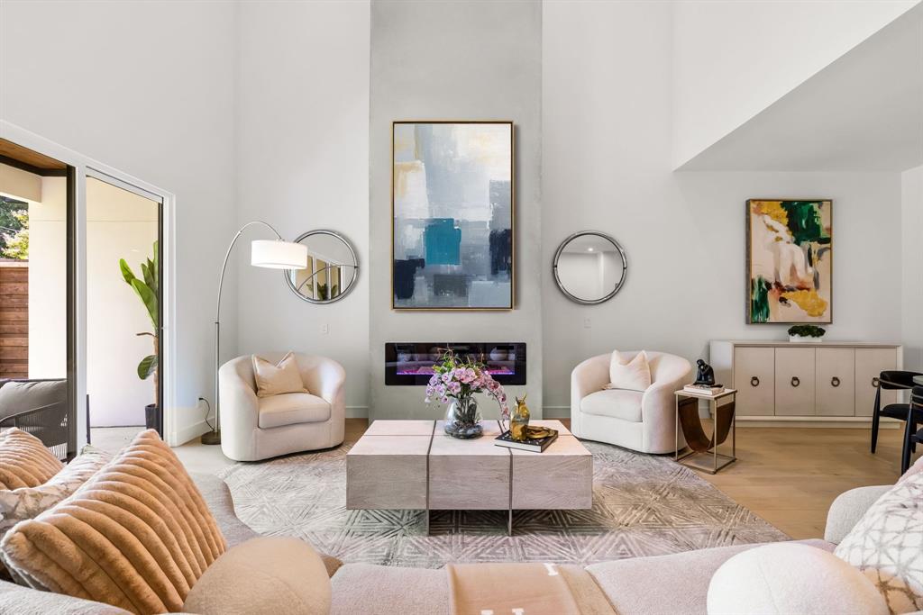 4322 Sexton Lane Dallas, TX 75229 - Photo 4 of 34 a living room with furniture and a large window