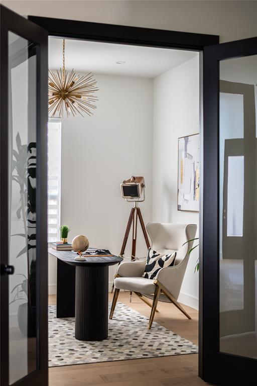 4322 Sexton Lane Dallas, TX 75229 - Photo 6 of 34 a living room with a couch and a potted plant