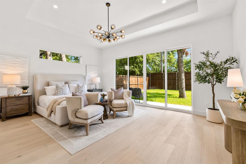 4322 Sexton Lane Dallas, TX 75229 - Photo 8 of 34 a living room with furniture and a chandelier