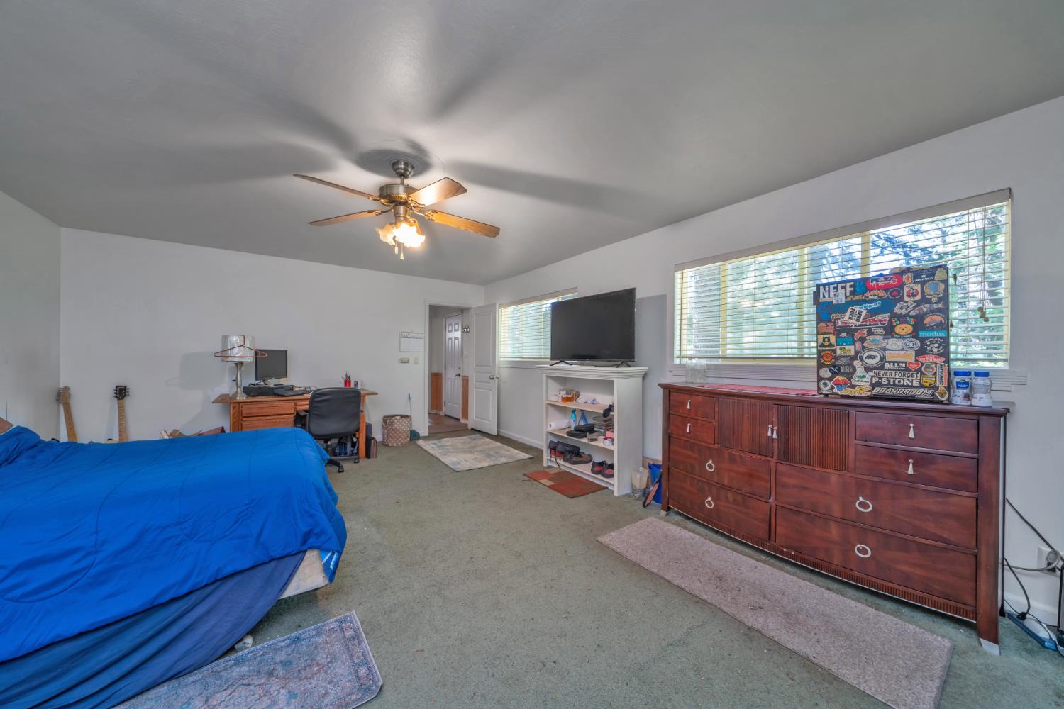6929 Split Bend Road Pollock Pines, CA 95726 - Photo 30 of 38 a bed room with a bed and a television