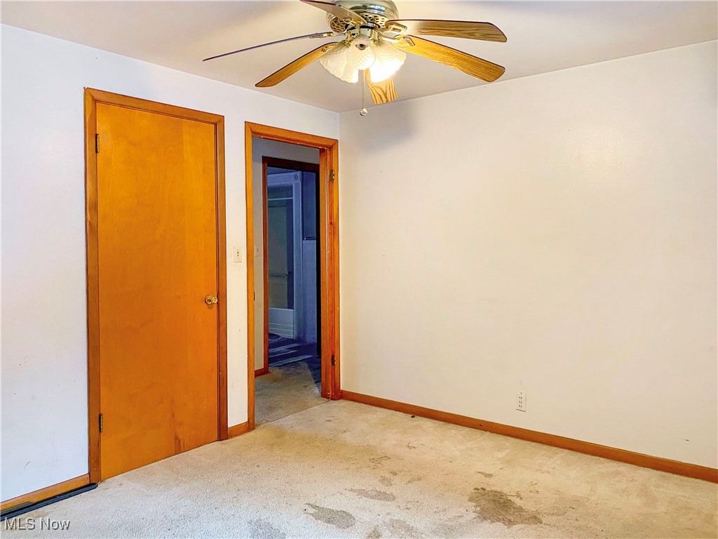 1034 Straub Road West Mansfield, OH 44904 - Photo 17 of 27 Unfurnished room with ceiling fan and light carpet