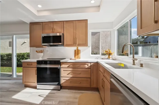 a bedroom with a bed and a cabinets