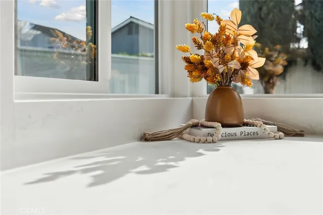 a bedroom with a bed and night stand