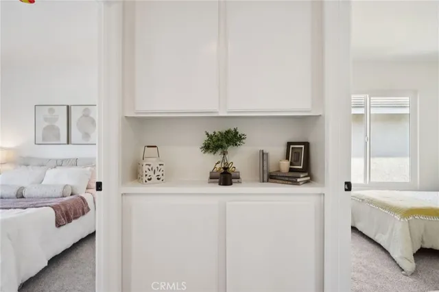 a bathroom with a sink toilet and mirror