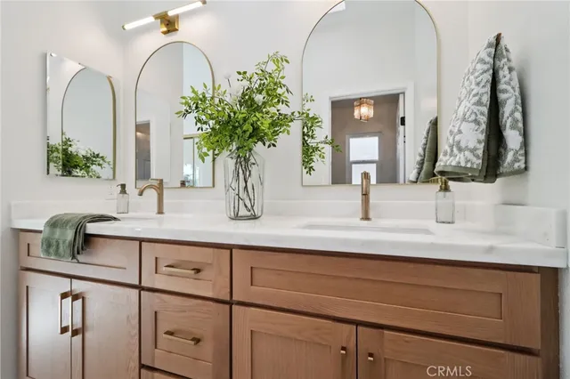 a view of a porch with furniture and garden