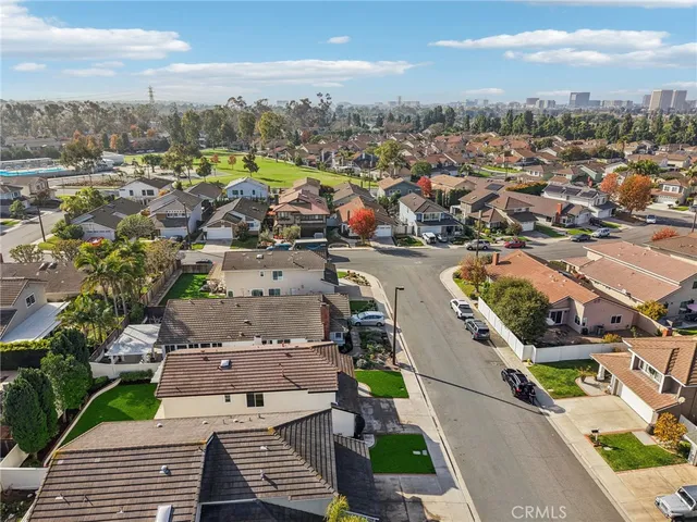 a picture of a bench in front of a building
