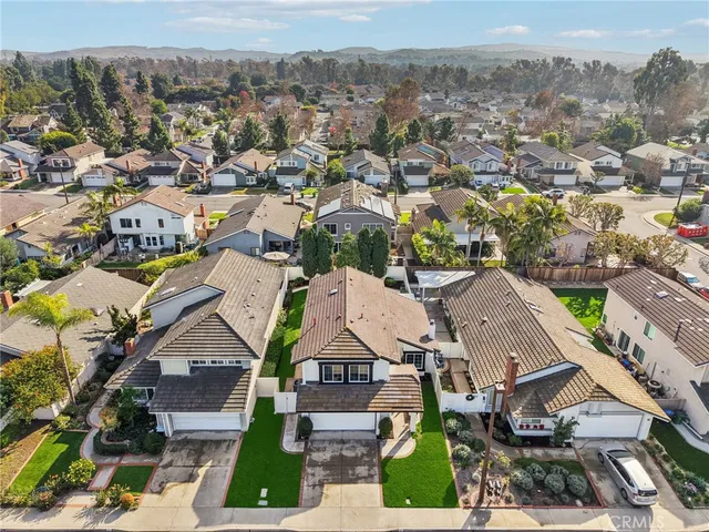 a view of a park with large trees