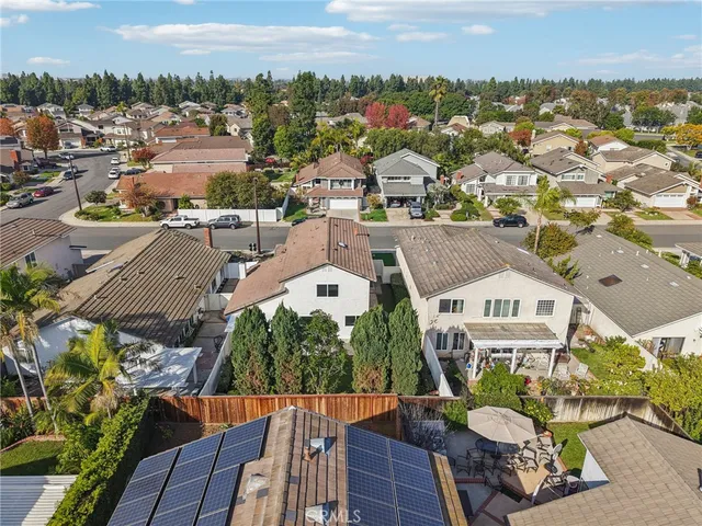 a view of a city with swimming pool and mountains