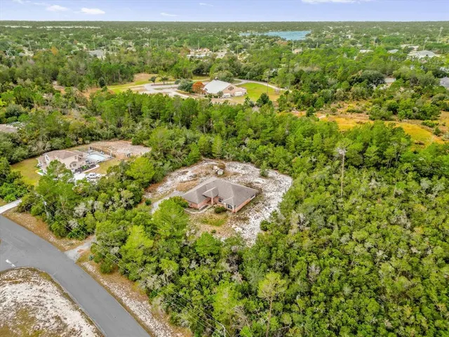 a view of a garden with an outdoor space